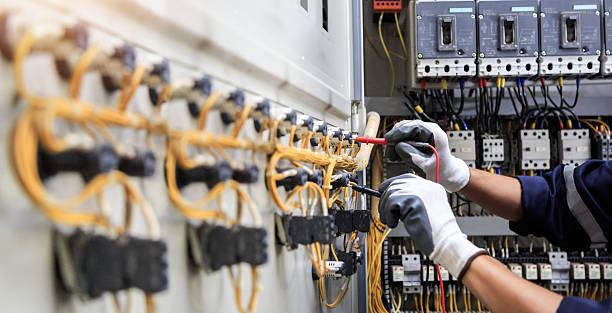 Professional Electrician technician working in Suncoast Estates, FL